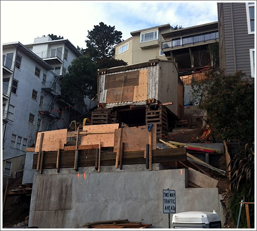 Remains Of Collapsed Home Hoisted, “Remodeling” To Recommence